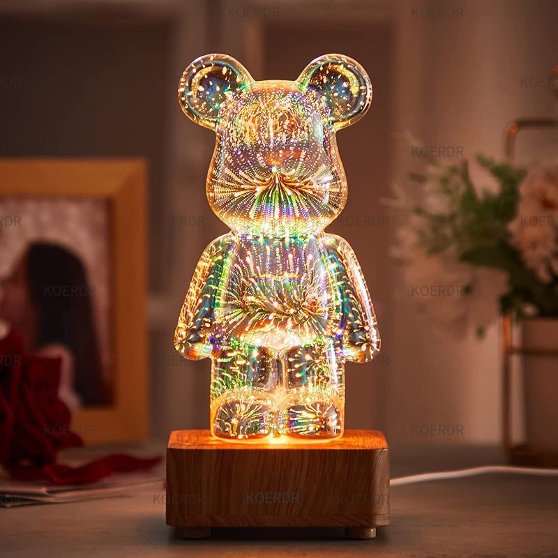 Transforme seus espaços com a Luminária de Mesa em Formato de Urso com Efeitos de Fogos de Artifício em 3D. Adicione um toque encantador e romântico à sua decoração. Ilumine seus ambientes com a magia dos fogos de artifício. Compre agora e crie uma atmosfera única e especial em sua casa ou escritório.